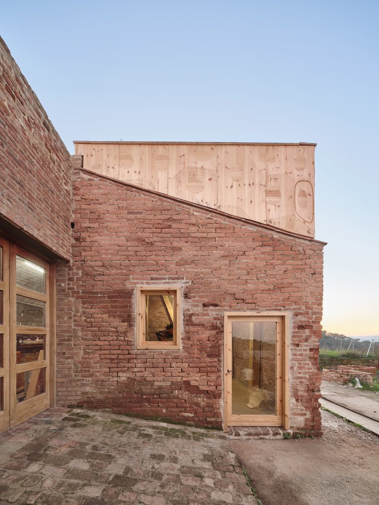 The brick facade in daylight.