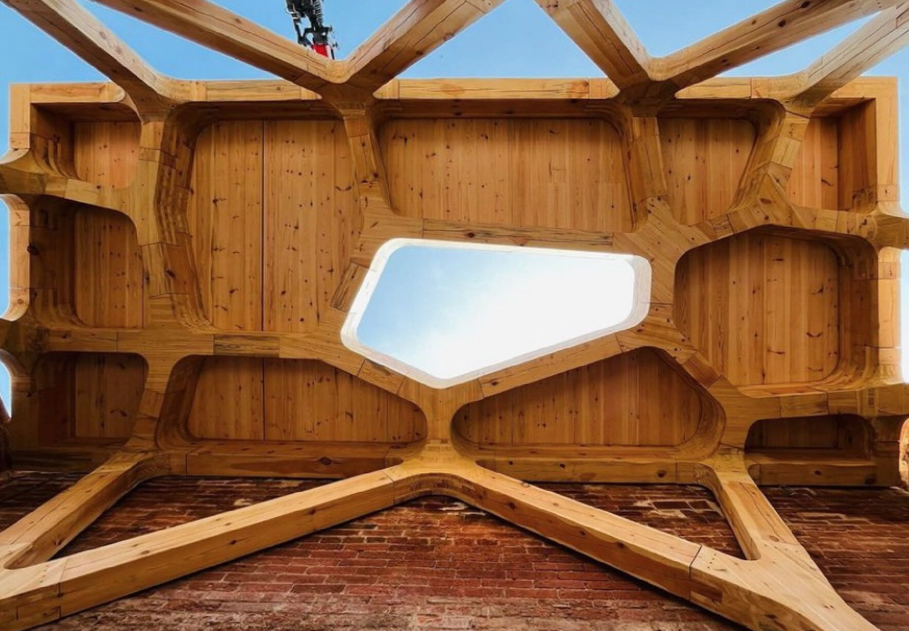 The vault from below, with its cellular voronoi pattern recalling the forest canopy.