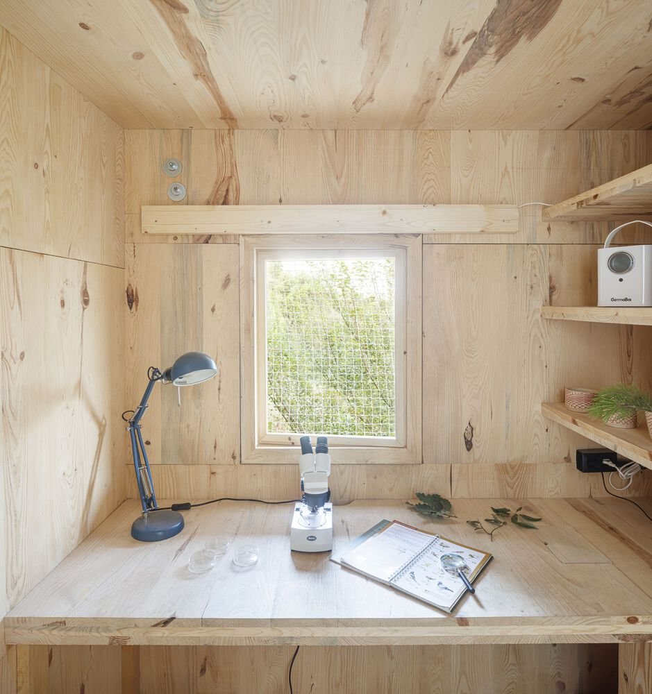 A small workspace tucked into the canopy.