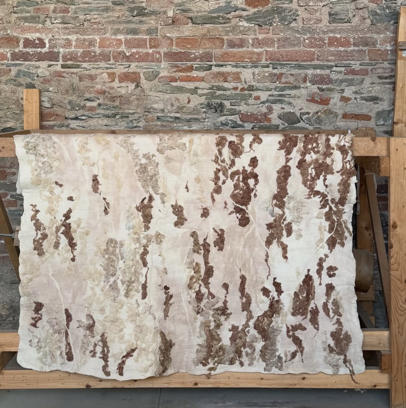 Upcycled waste wool felted for interior finishings.