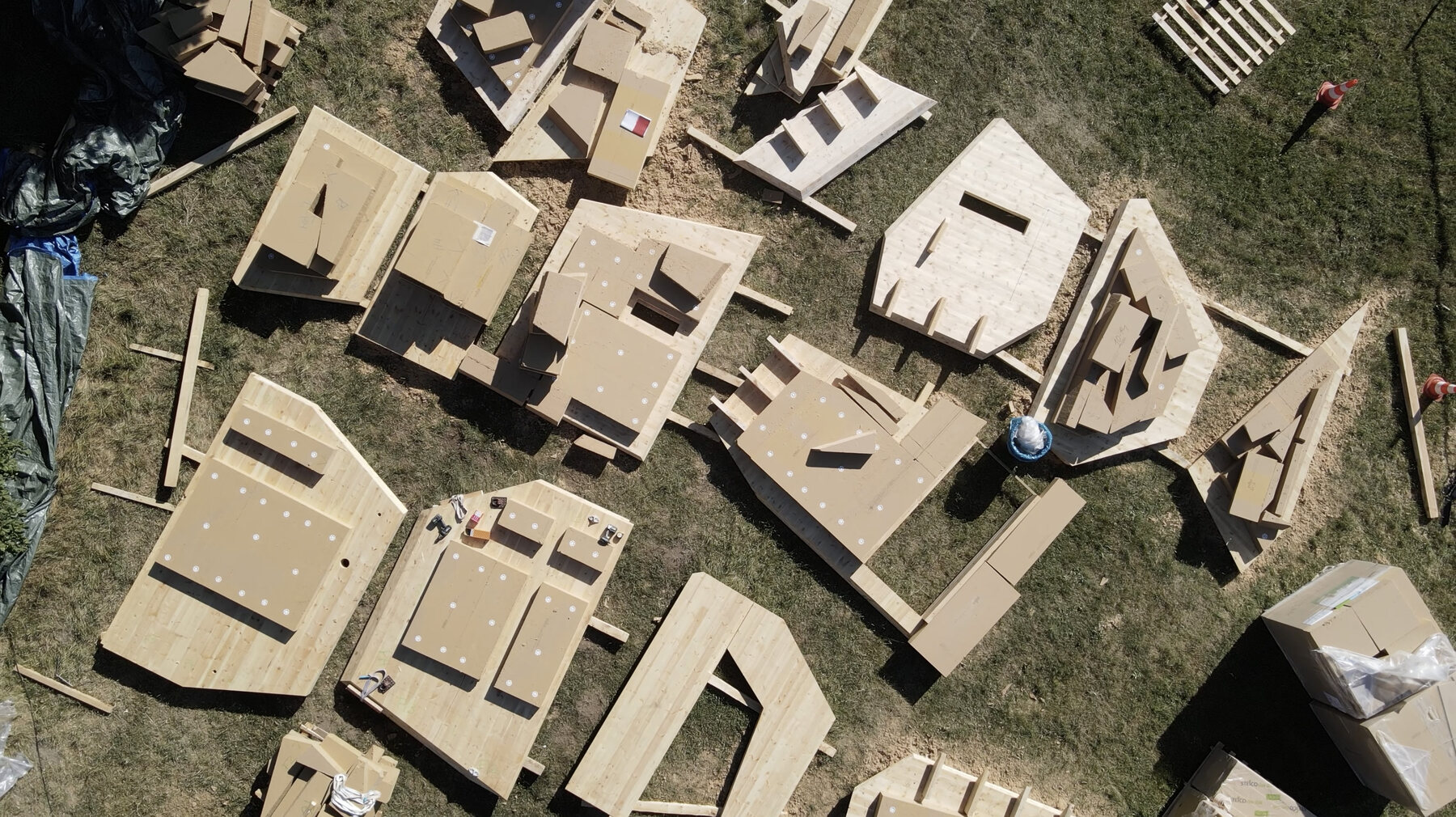 Prefabricated panels laid out before the lift.