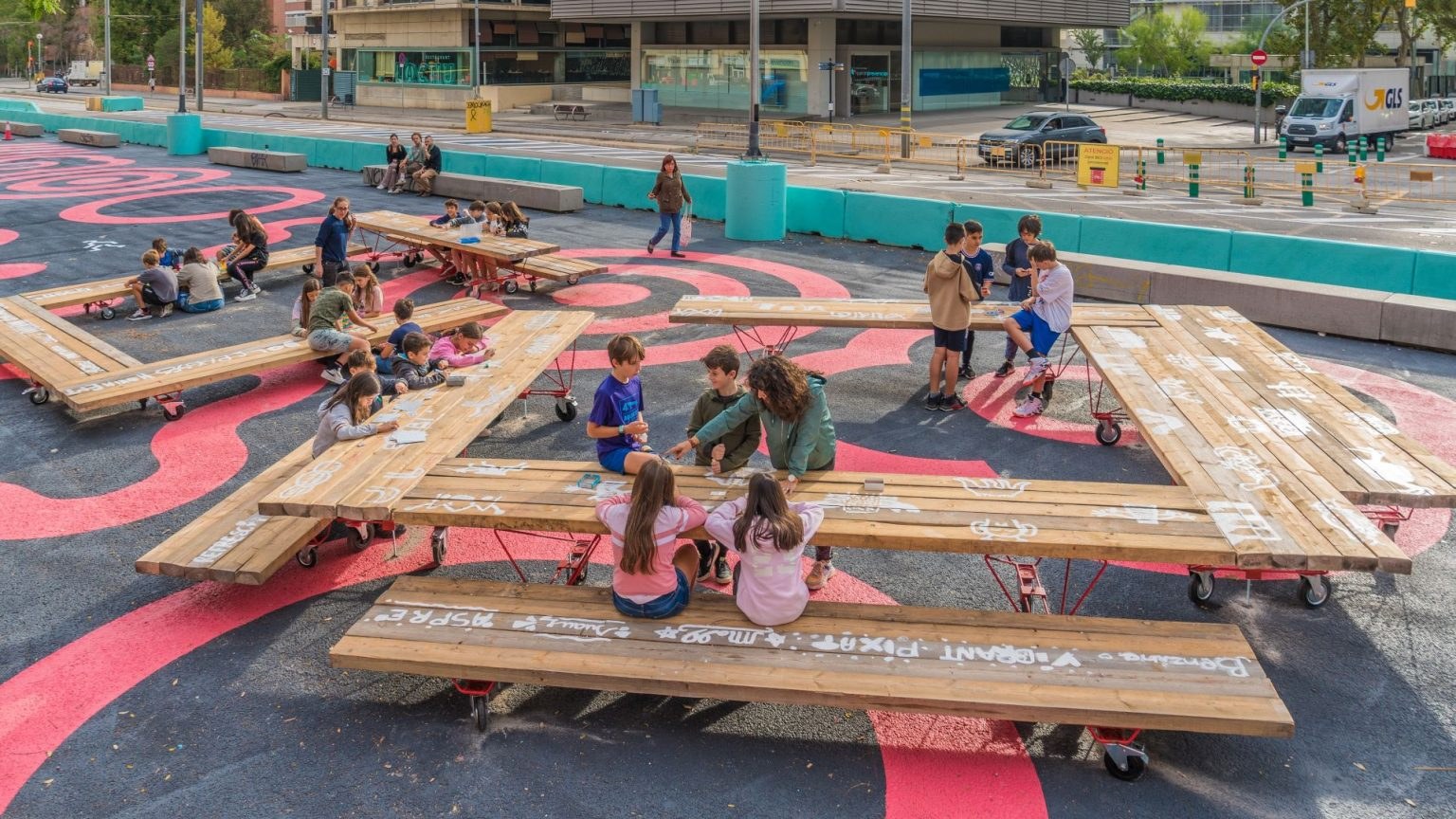Kids co-designing with the Mobile Urban Elements on Carrer de Pere IV, Barcelona — one of the book's pilot sites.