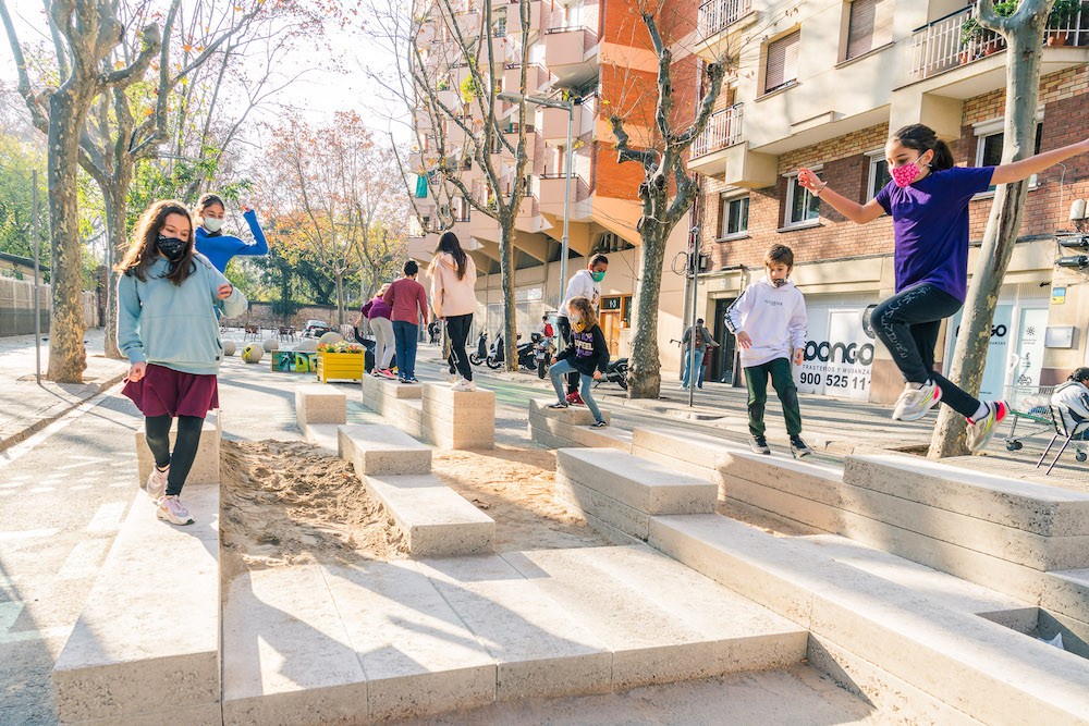 Testing Elisava's rammed-earth stepped street installation with the students who will use it, Barcelona, Spain.