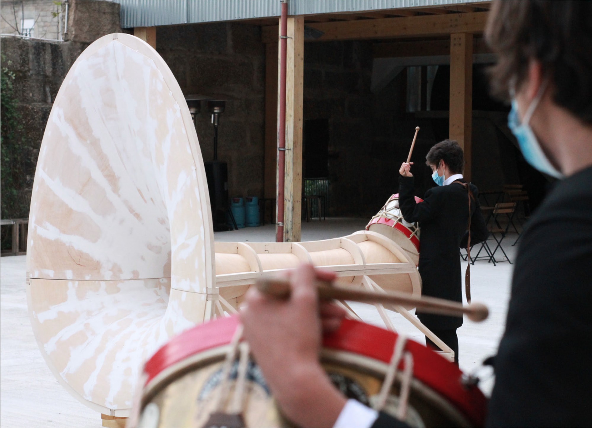 AEIOU by EAUM & I+D+Arq in use to project live drumming for a socially-distanced street festival, Guimarães, Portugal.