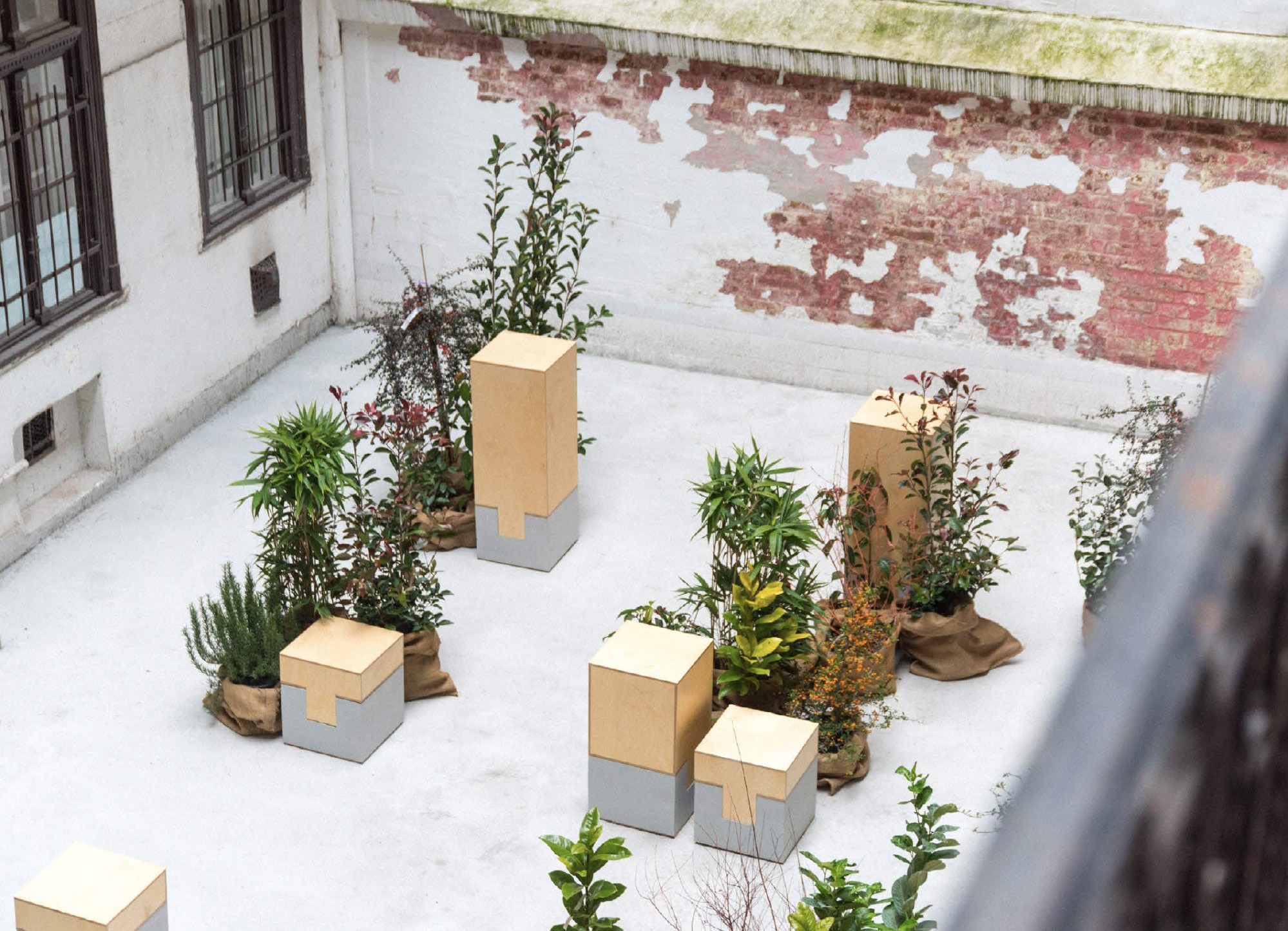 BP Gang by Fab Lab Budapest modular wood elements activate a courtyard in Budapest, Hungary.