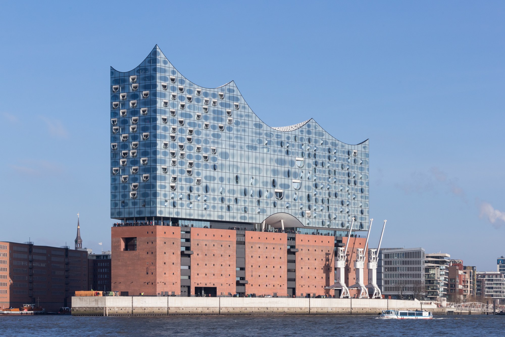 Herzog & de Meuron's Elbphilharmonie Hamburg is a stunning example of the architectural potential of vertical extensions to existing buildings.