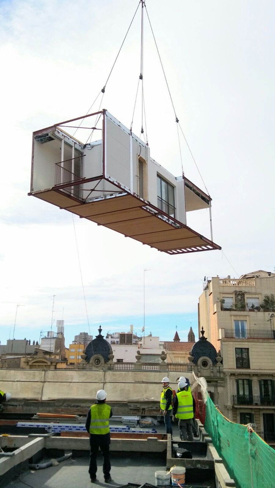 Optoppen leverages prefabricated modular timber assemblies to quickly enhance existing buildings with new vertical stories.