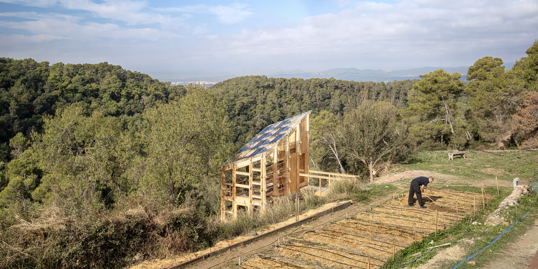 The greenhouse set into the Valldaura gardens.