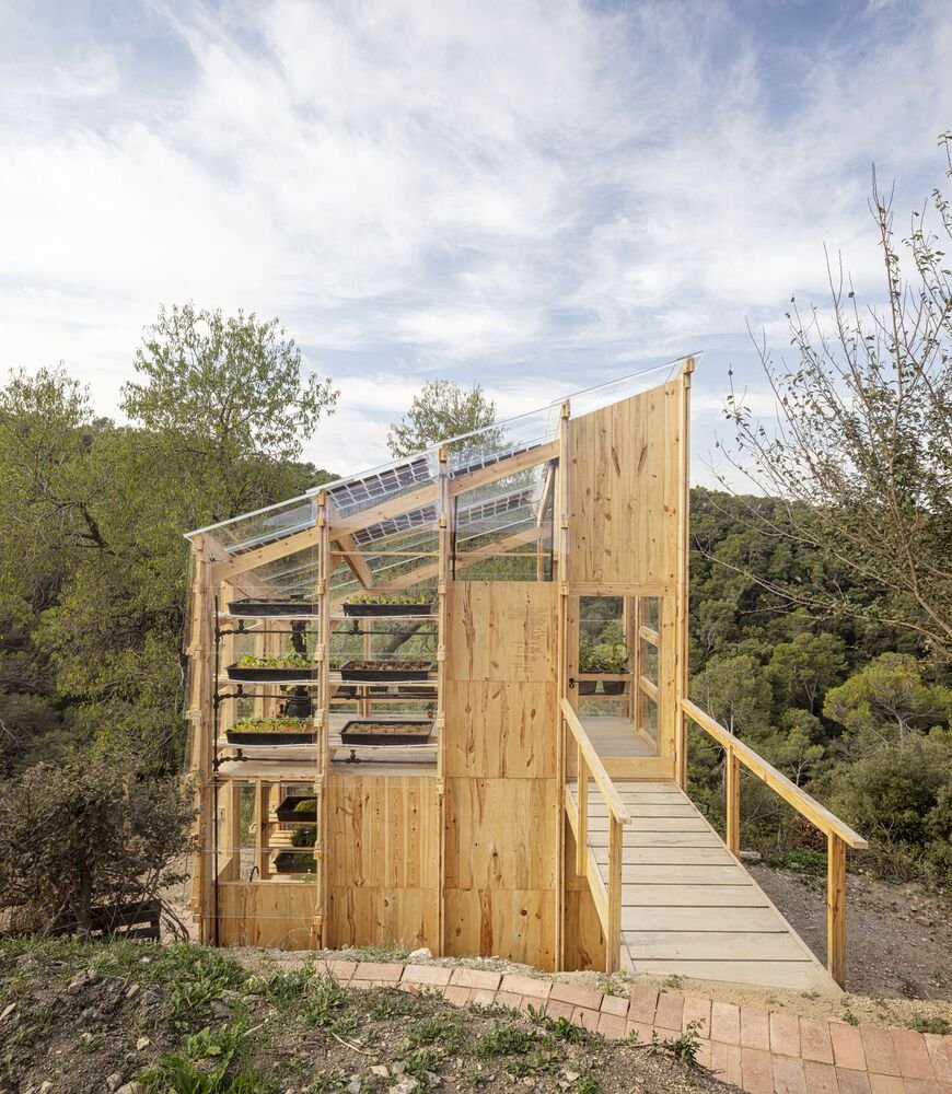 The walkway bridge leading to the upper growing level.