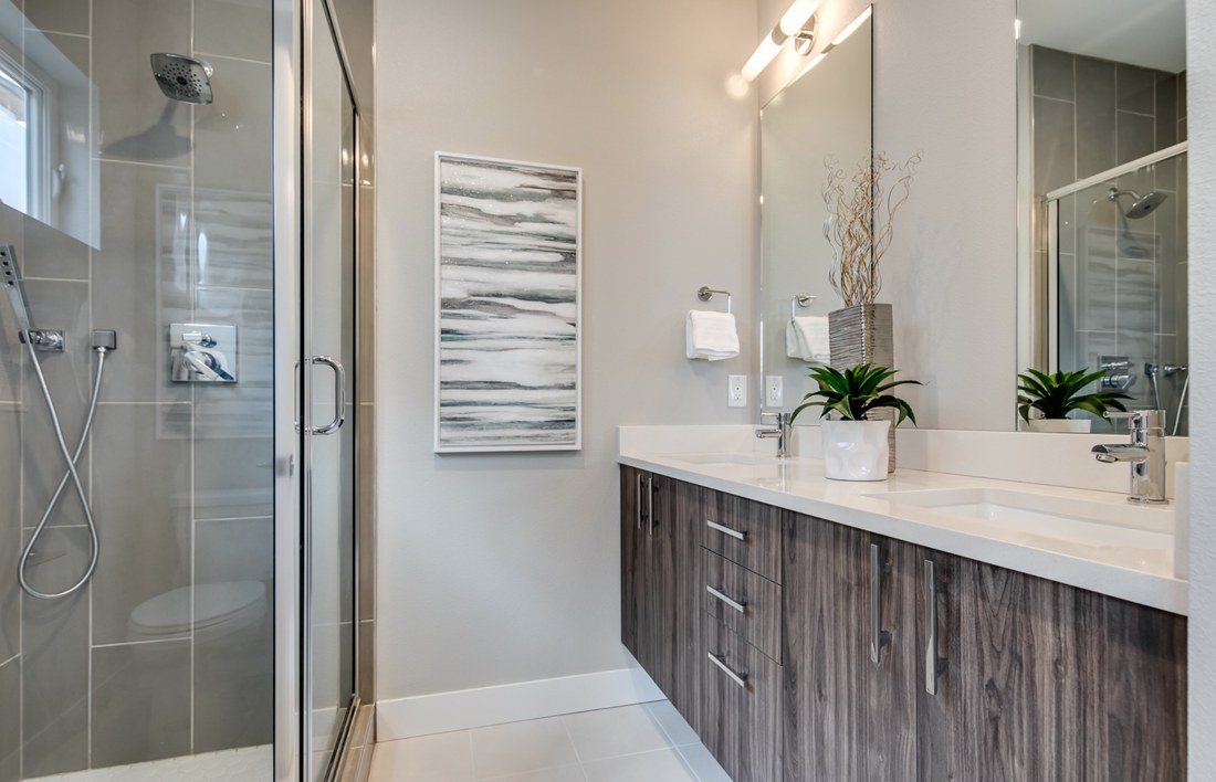 Primary bathroom with premium finishes and fixtures.
