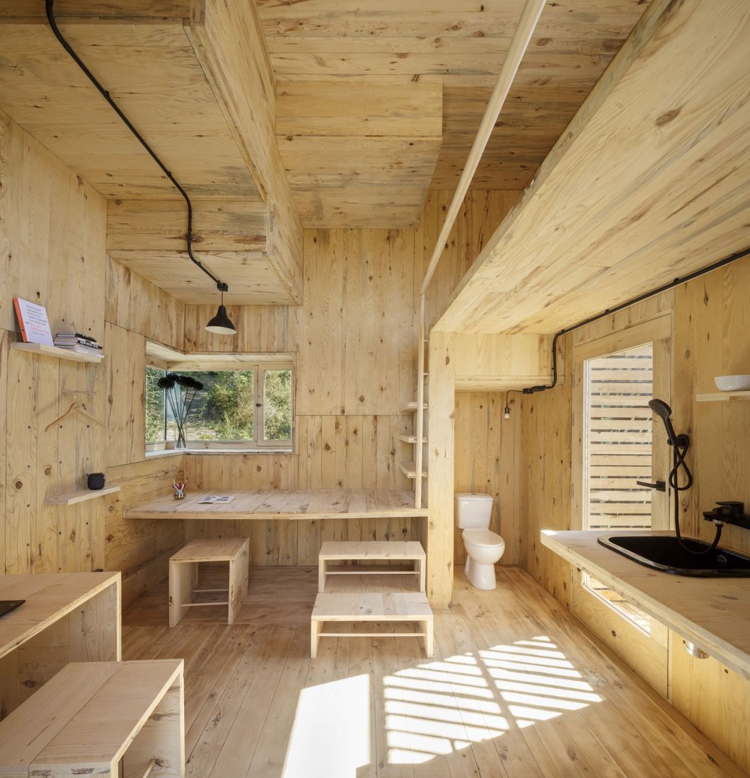 Interior — the bathroom, built entirely in timber.
