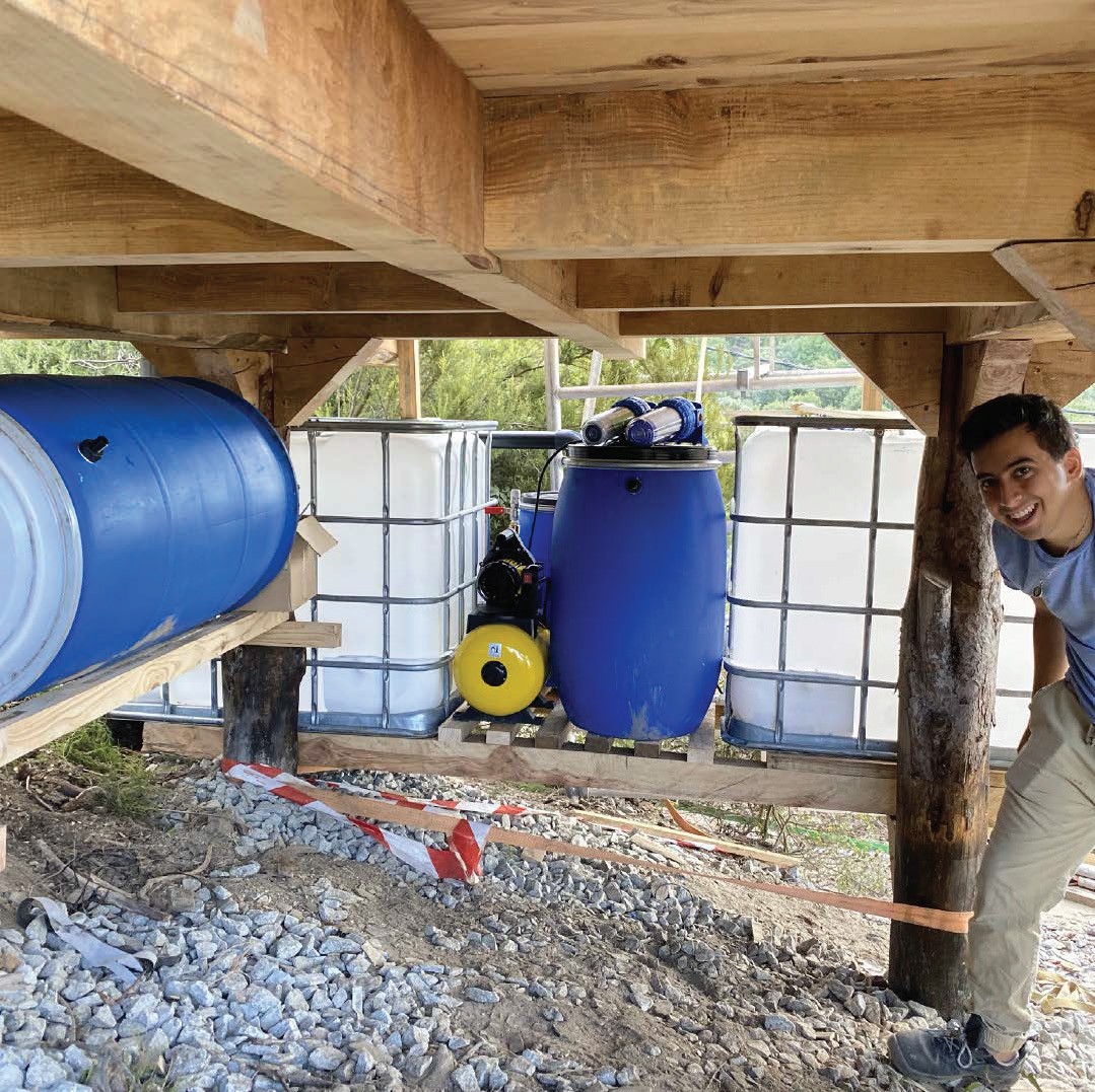 In addition to being concealed within the volumetric frames of the rain screen, utilities are suspended below the cabin for easy maintenance access.